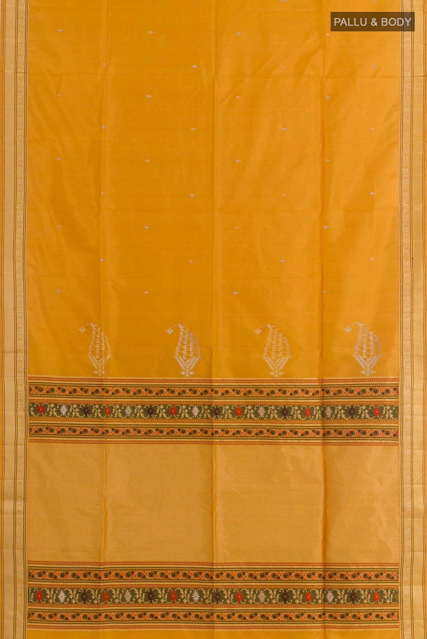 Flat view of Yellow Soft Silk Saree with Zari Butta on the body and Zari Border. 