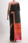 Black Soft Silk Saree with Zari Butta on the body and Zari Border.  displayed on a mannequin