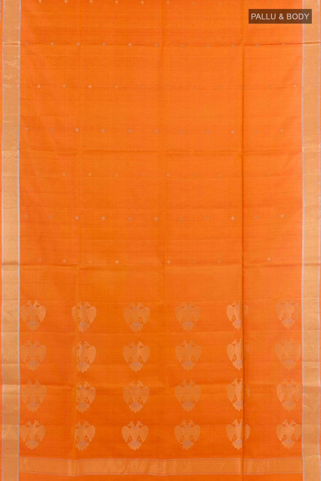Flat view of Orange Soft Silk Saree with Zari Butta on the body and Zari Border. 