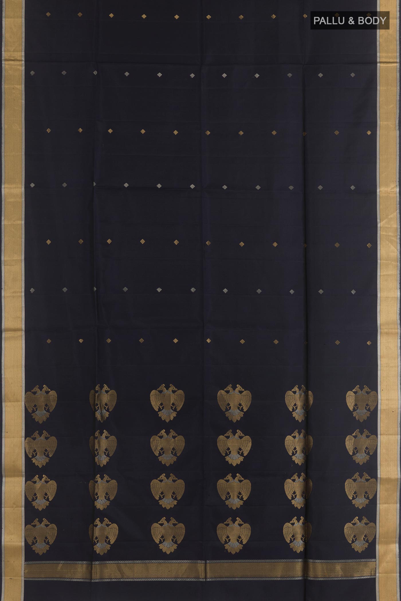 Flat view of Dark Blue Soft Silk Saree with Zari Butta on the body and Zari Border. 