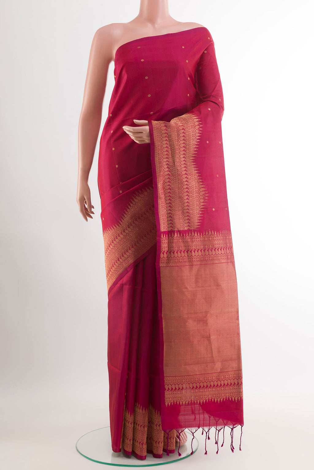 Magenta Soft Silk Saree with Zari Butta on the body and Zari Border.  displayed on a mannequin