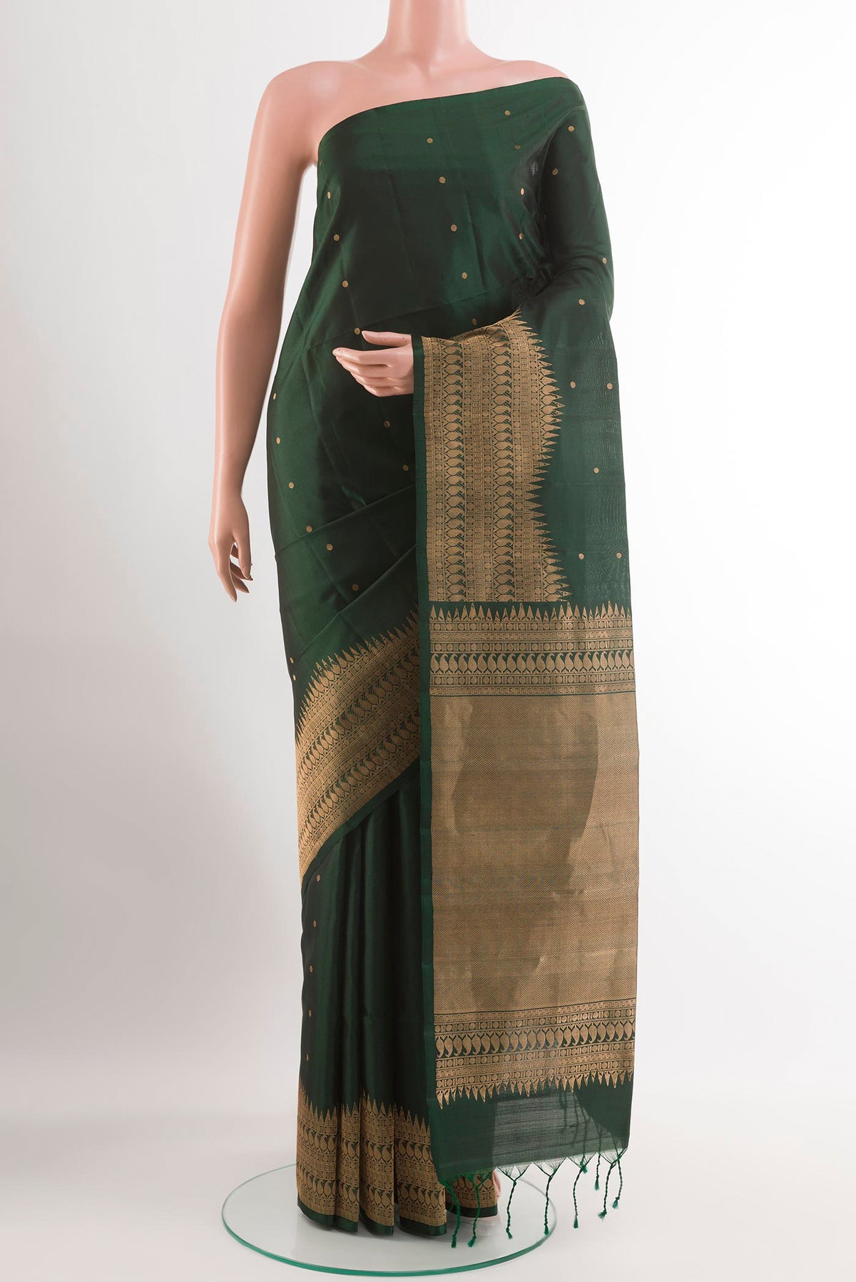 Black Soft Silk Saree with Zari Butta on the body and Zari Border.  displayed on a mannequin
