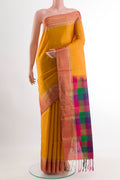 Yellow Soft Silk Saree with Plain Body and Zari Border.  displayed on a mannequin