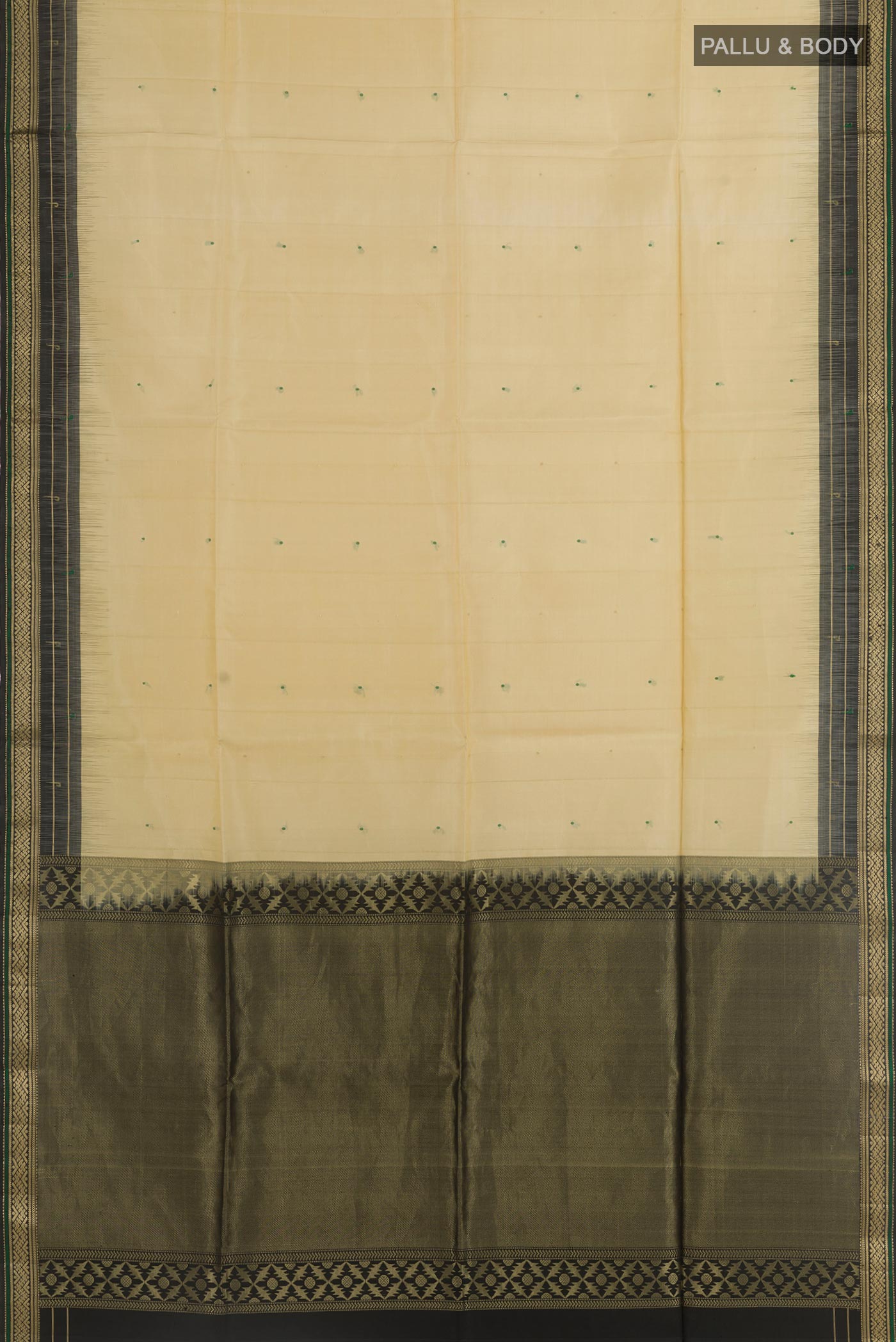 Flat view of Beige Soft Silk Saree with Zari Butta on the body and Zari Border. 