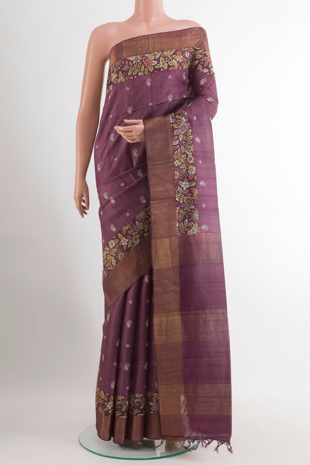 Purple Tussar Saree with Thread Butta on the body and Zari Border.  displayed on a mannequin