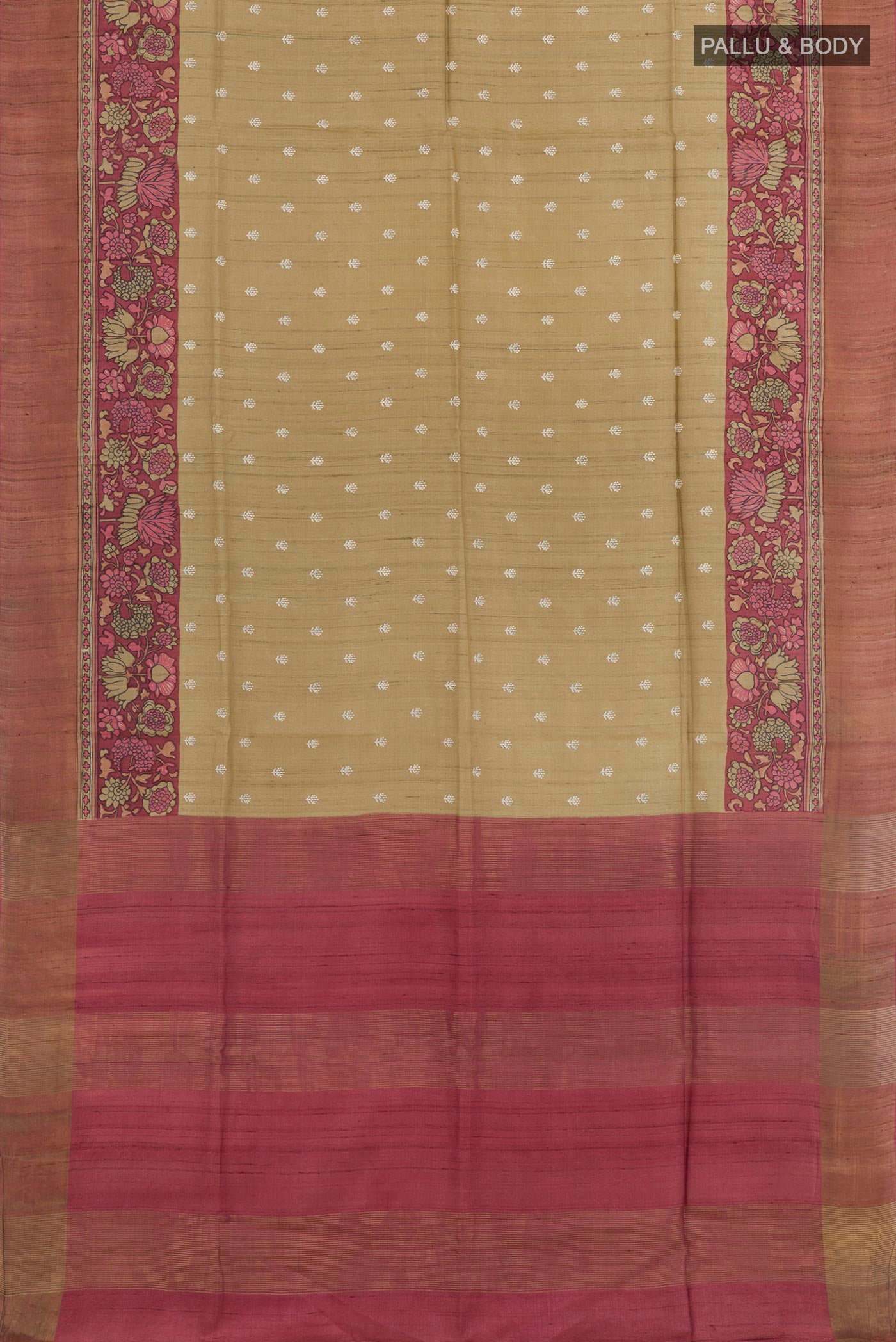 Flat view of Beige Tussar Saree with Thread Butta on the body and Zari Border. 