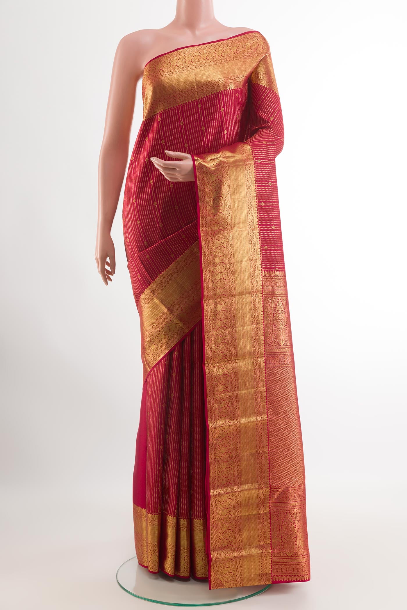 Red Kanchipuram Silk Saree with Zari Brocade on the body and Zari Border.  displayed on a mannequin
