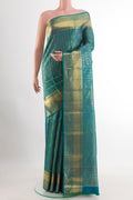 Sea Green Kanchipuram Silk Saree with Zari Brocade on the body and Zari Border.  displayed on a mannequin