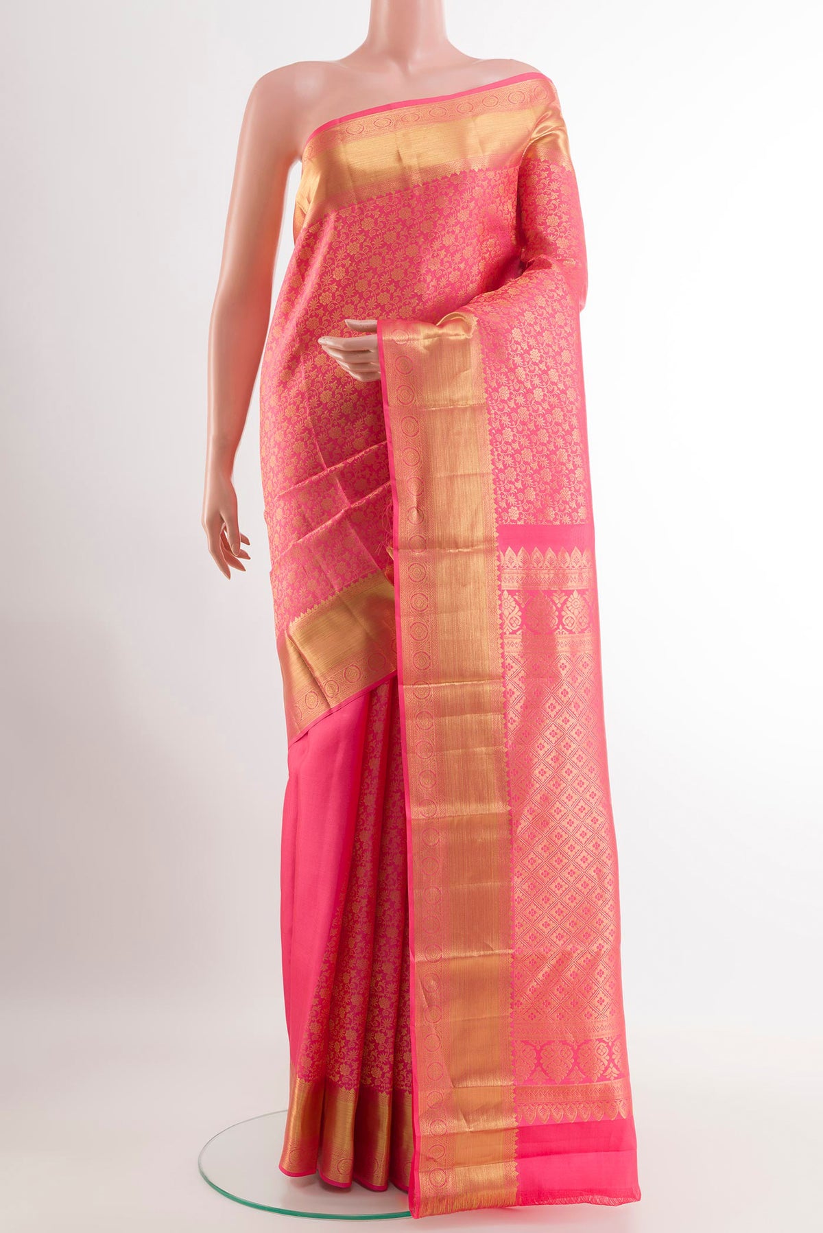 Pink Kanchipuram Silk Saree with Zari Brocade on the body and Zari Border.  displayed on a mannequin