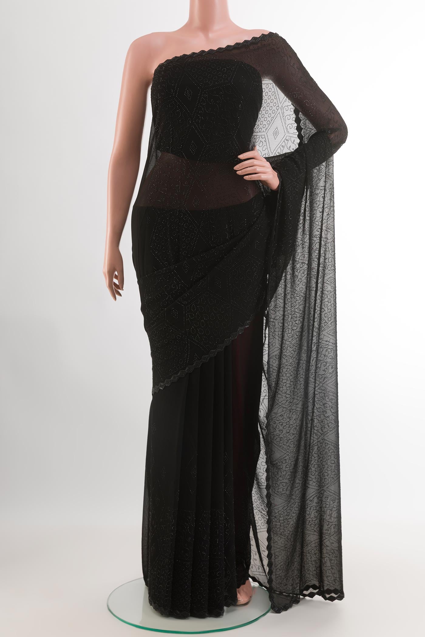 Black Blended Art Silk Saree with Embroidery on the body and Embroidery Border.  displayed on a mannequin