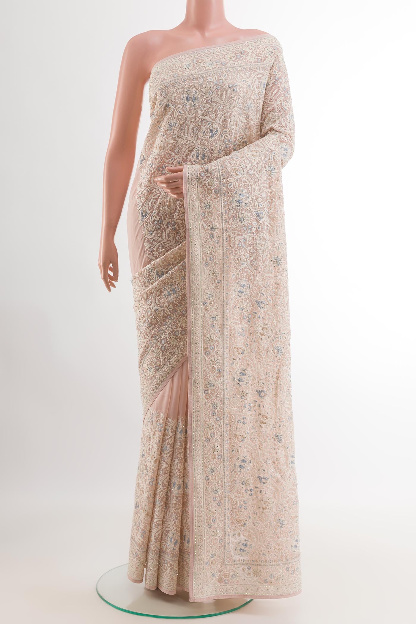 Pink Blended Art Silk Saree with Embroidery on the body and Embroidery Border.  displayed on a mannequin