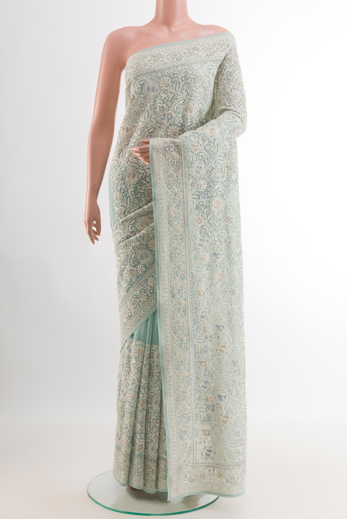 Blue Blended Art Silk Saree with Embroidery on the body and Embroidery Border.  displayed on a mannequin
