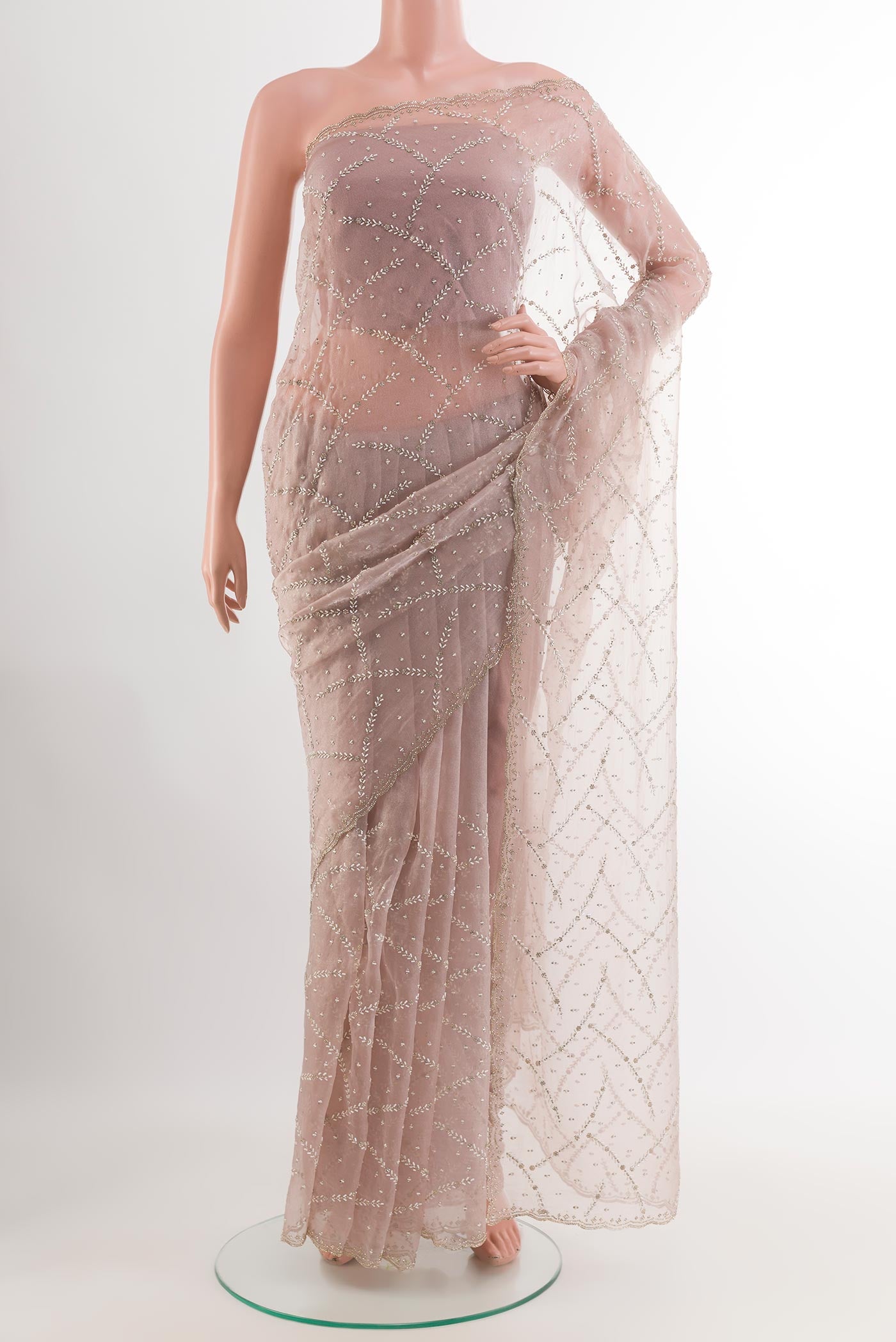 Lavender Blended Art Silk Saree with Embroidery on the body and Embroidery Border.  displayed on a mannequin