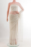 White Blended Art Silk Saree with Embroidery on the body and Embroidery Border.  displayed on a mannequin