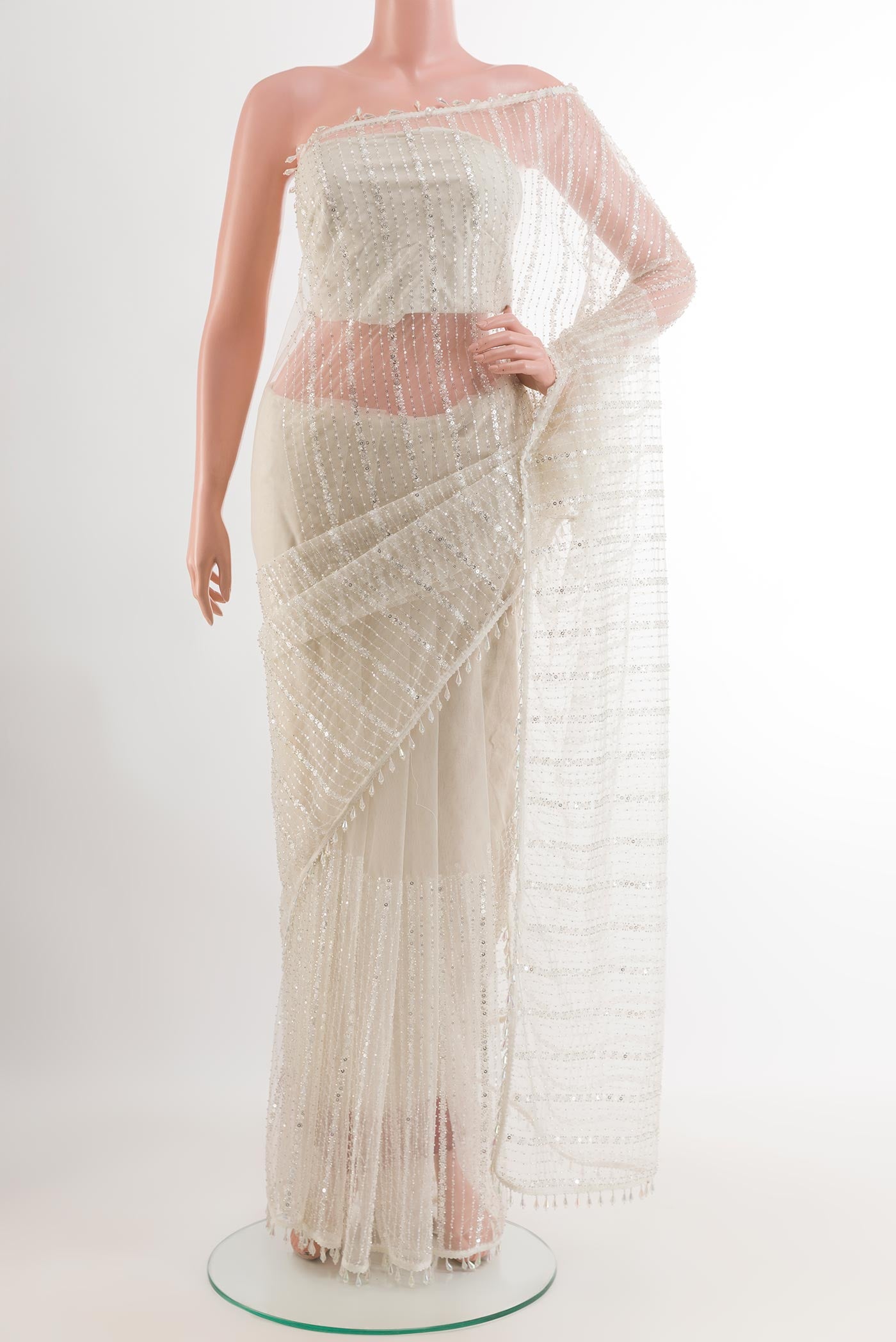 White Blended Art Silk Saree with Embroidery on the body and Embroidery Border.  displayed on a mannequin
