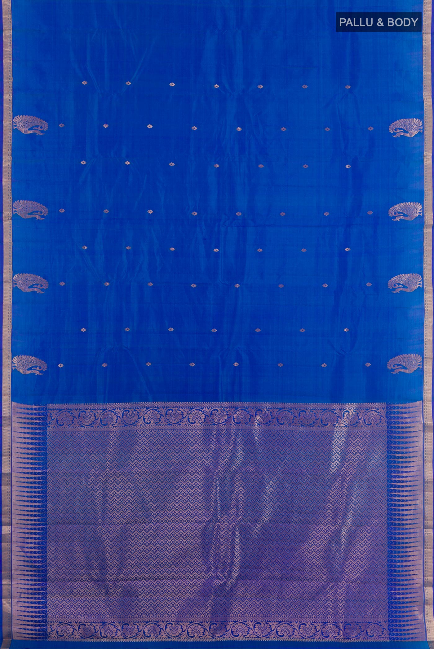 Flat view of Blue Kanchipuram Silk Saree with Zari Butta on the body and Zari Border. 