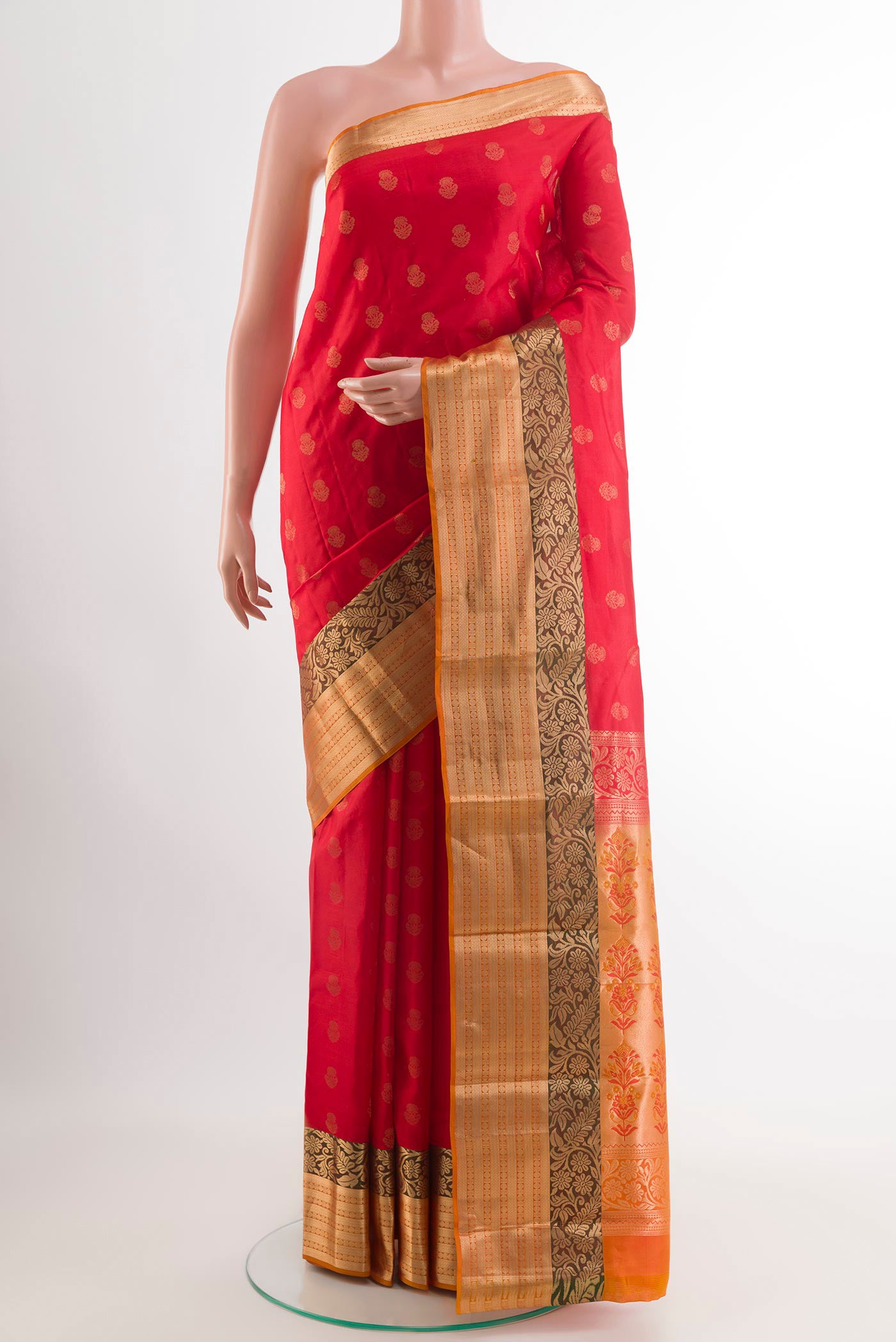 Red Kanchipuram Silk Saree with Zari Butta on the body and Zari Border.  displayed on a mannequin