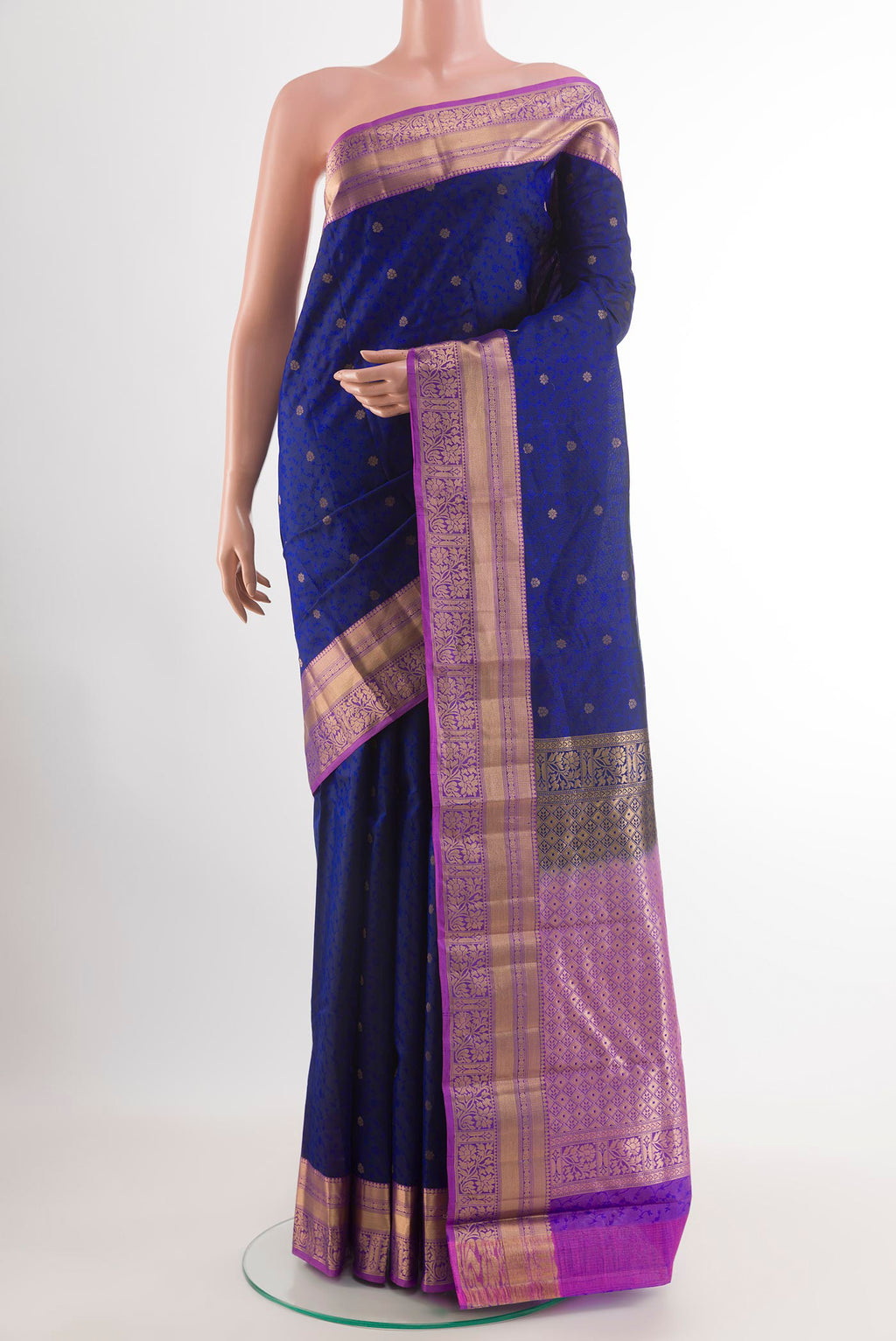 Dark Blue Kanchipuram Silk Saree with Jacquard With Zari Butta on the body and Zari Border.  displayed on a mannequin