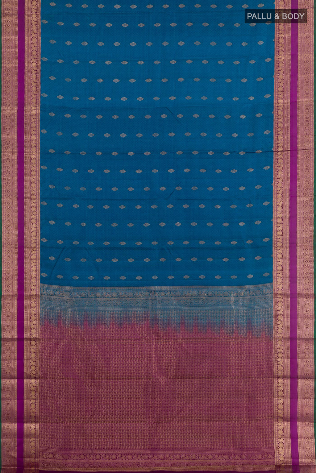 Flat view of Peacock Blue Kanchipuram Silk Saree with Jacquard With Zari Butta on the body and Zari Border. 