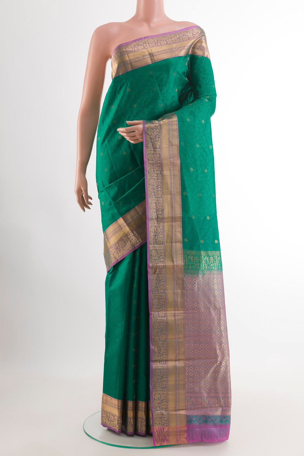 Green Kanchipuram Silk Saree with Jacquard With Zari Butta on the body and Zari Border.  displayed on a mannequin