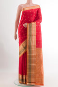 Red Kanchipuram Silk Saree with Jacquard With Zari Butta on the body and Zari Border.  displayed on a mannequin