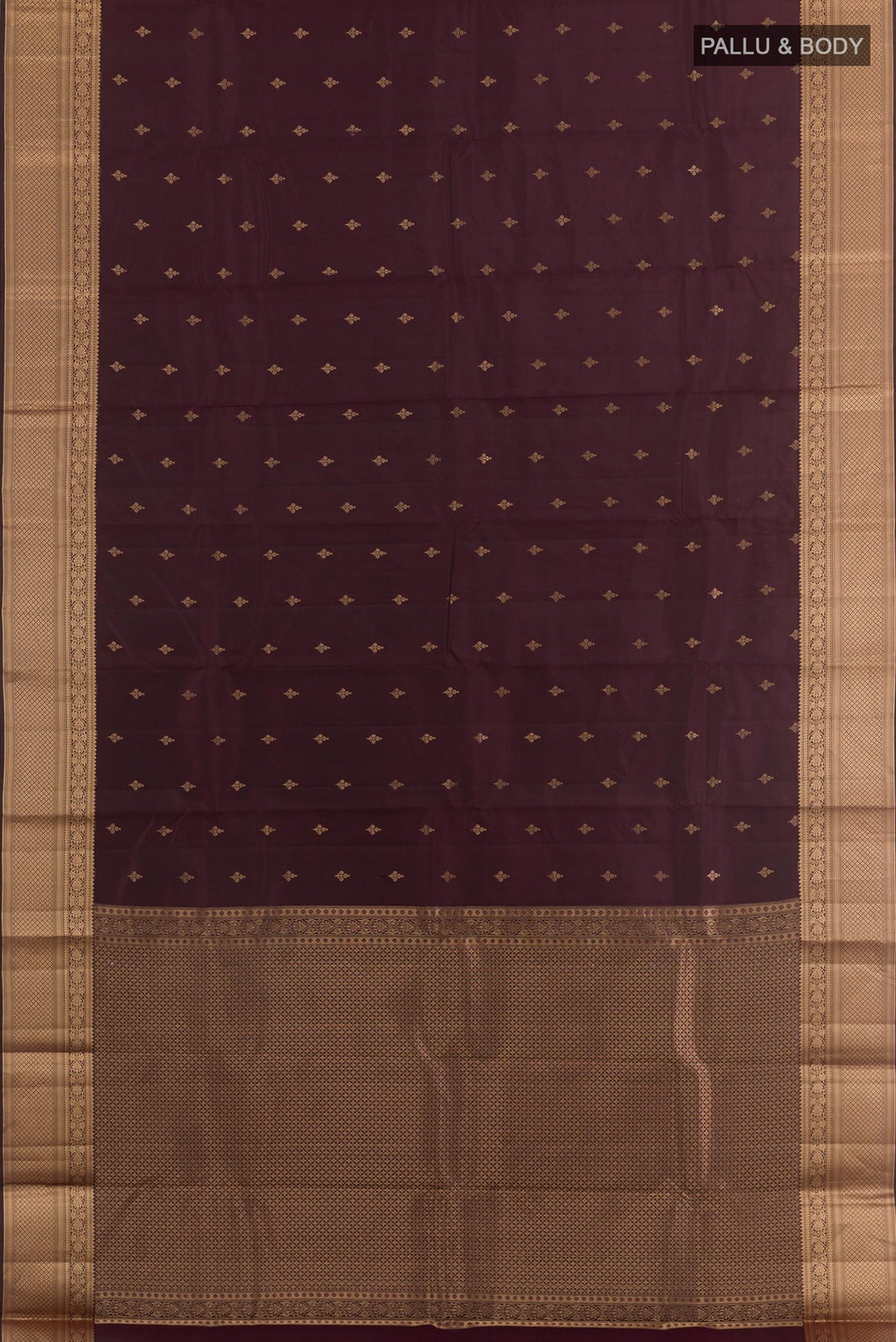 Flat view of Purple Kanchipuram Silk Saree with Zari Butta on the body and Zari Border. 