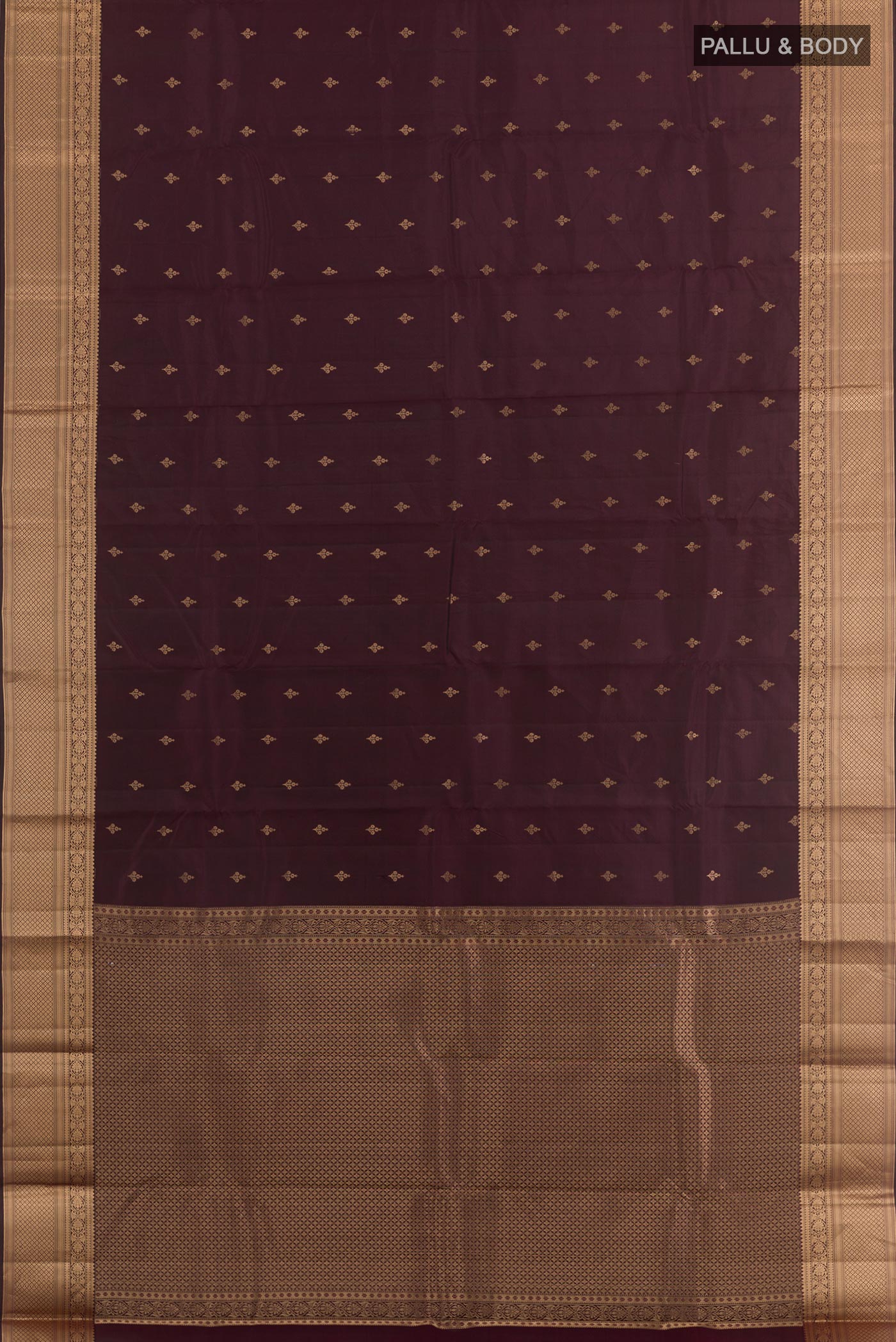 Flat view of Purple Kanchipuram Silk Saree with Zari Butta on the body and Zari Border. 