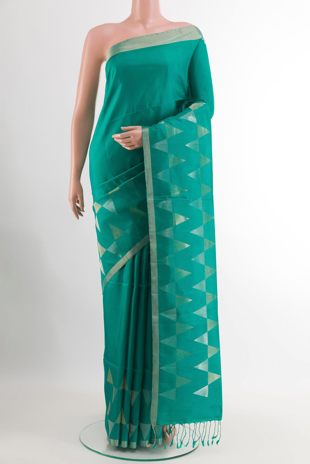 Sea Green Soft Silk Saree with Zari Butta on the body and Zari Border.  displayed on a mannequin