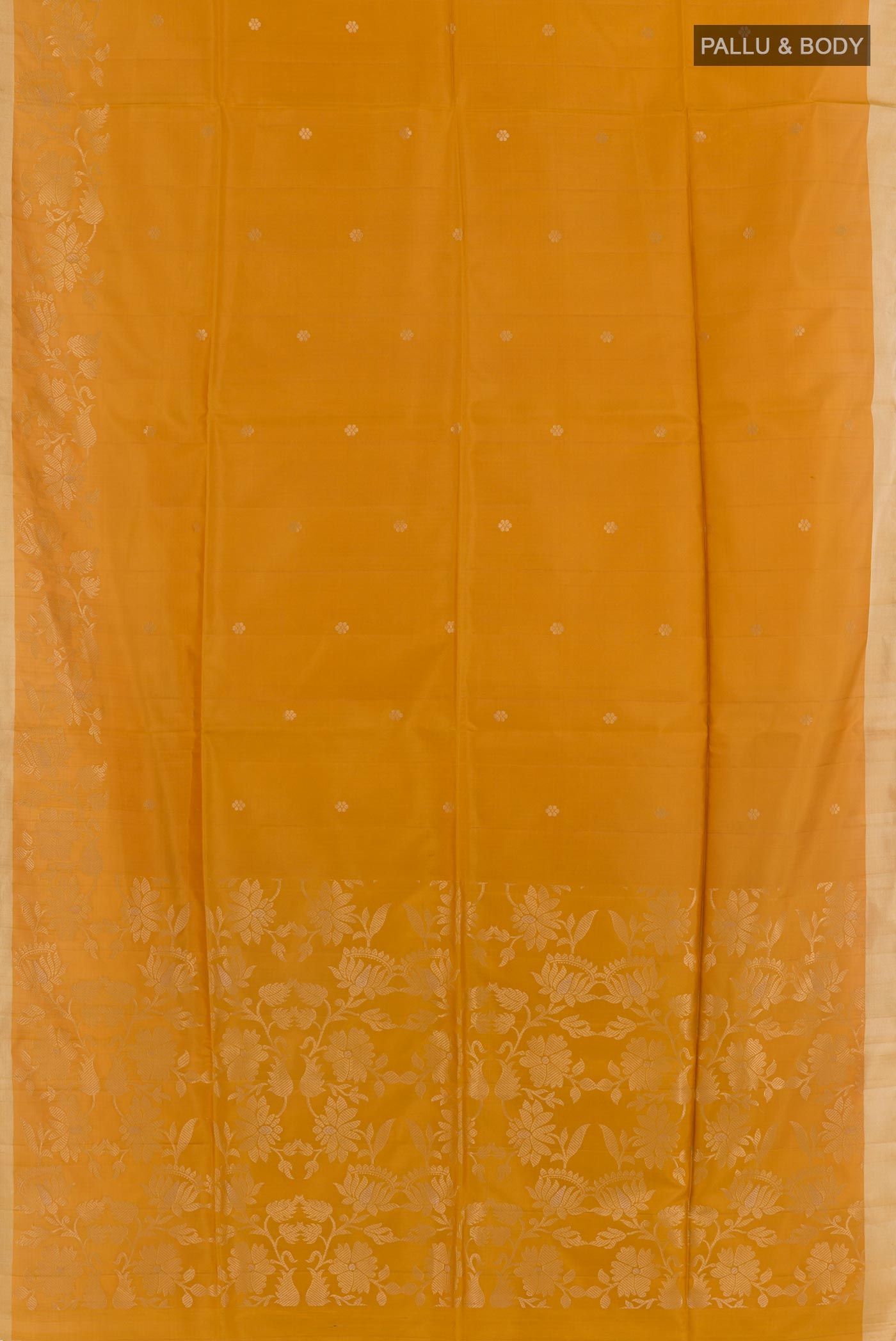 Flat view of Yellow Soft Silk Saree with Zari Butta on the body and Zari Border. 