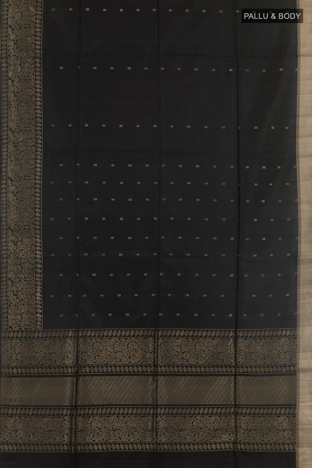 Flat view of Black Soft Silk Saree with Zari Butta on the body and Zari Border. 