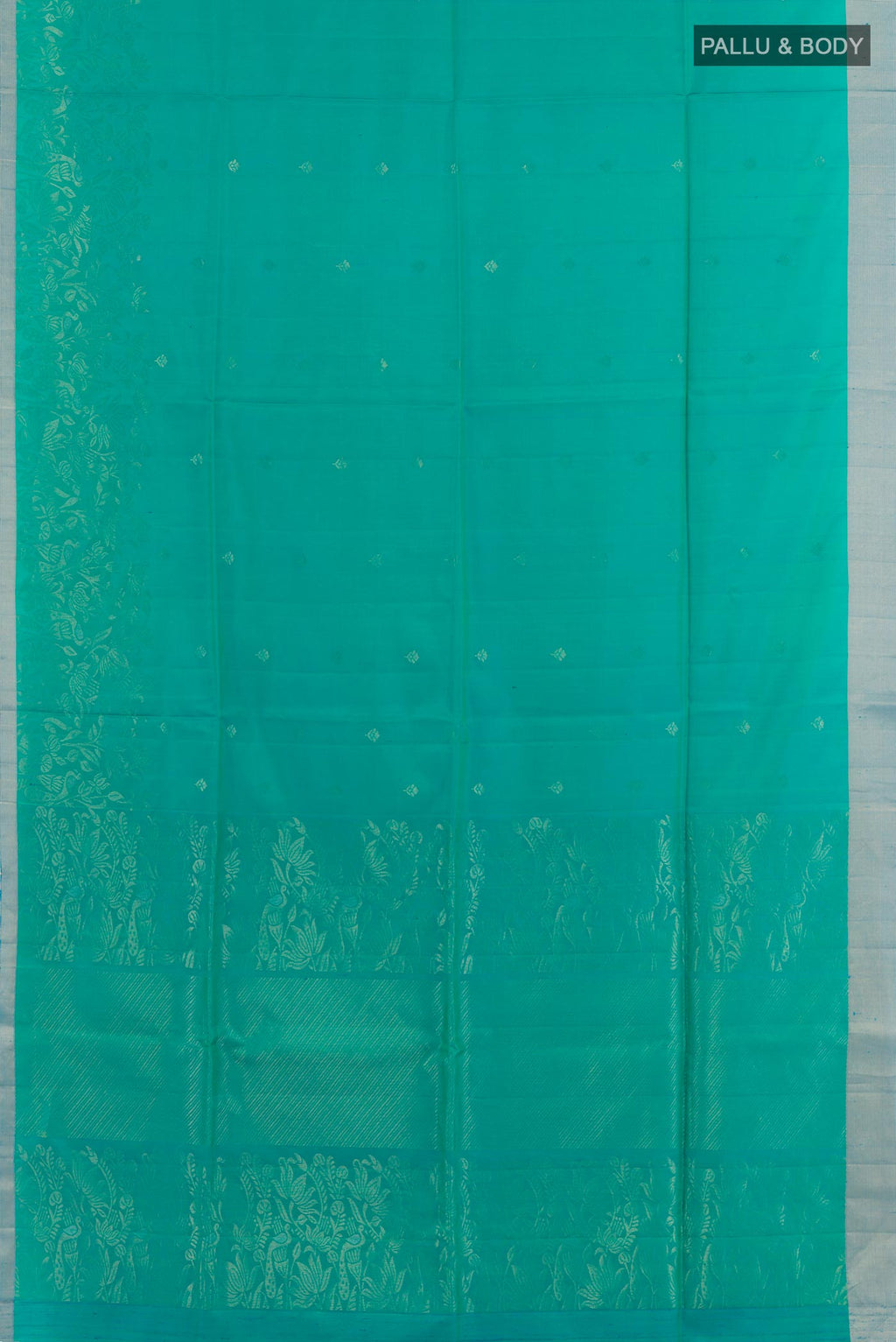 Flat view of Sea Green Soft Silk Saree with Zari Butta on the body and Zari Border. 