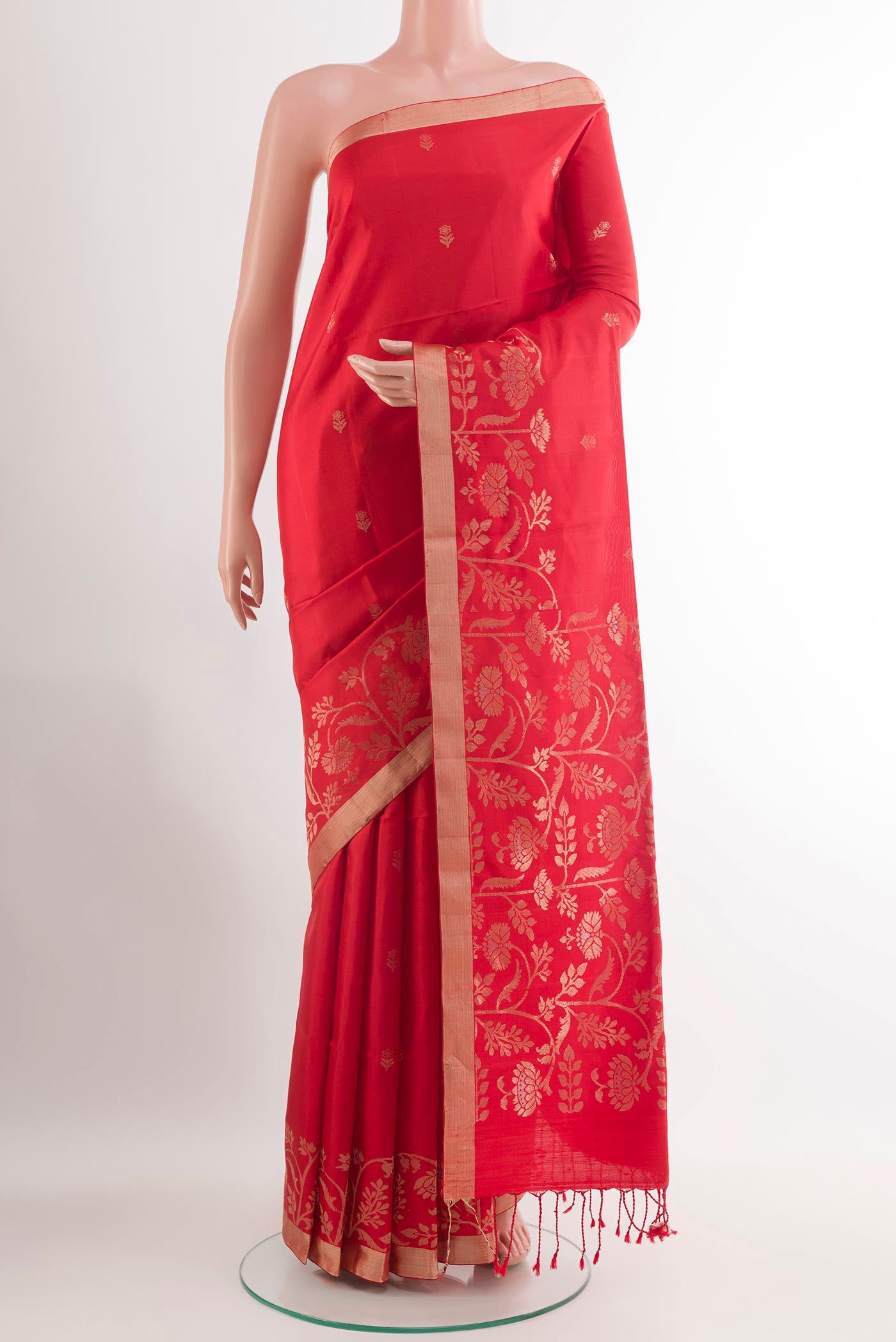 Red Soft Silk Saree with Zari Butta on the body and Zari Border.  displayed on a mannequin