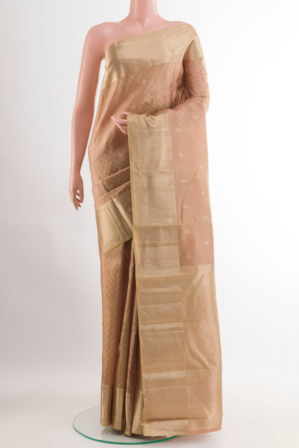 Beige Kanchipuram Silk Saree with Jacquard With Zari Butta on the body and Zari Border.  displayed on a mannequin