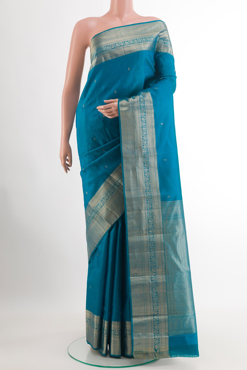Blue Kanchipuram Silk Saree with Jacquard With Zari Butta on the body and Zari Border.  displayed on a mannequin