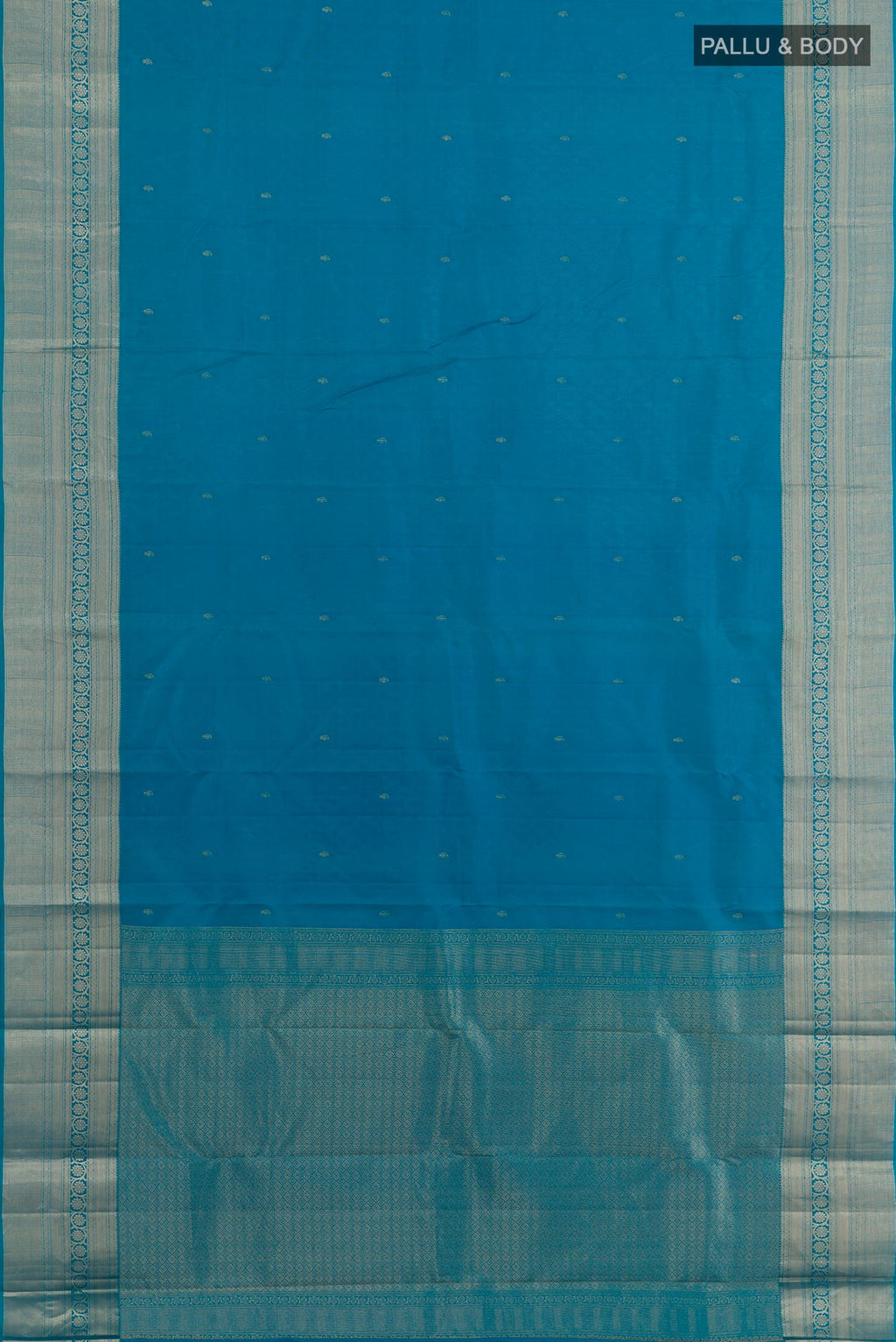 Flat view of Blue Kanchipuram Silk Saree with Jacquard With Zari Butta on the body and Zari Border. 