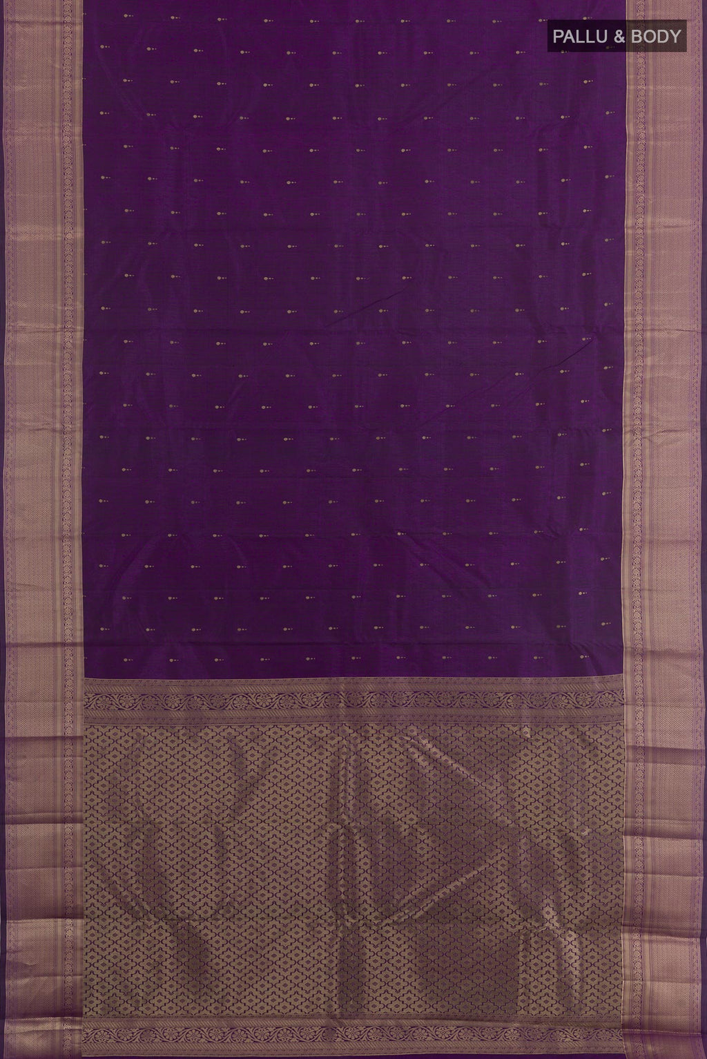 Flat view of Purple Kanchipuram Silk Saree with Zari Butta on the body and Zari Border. 