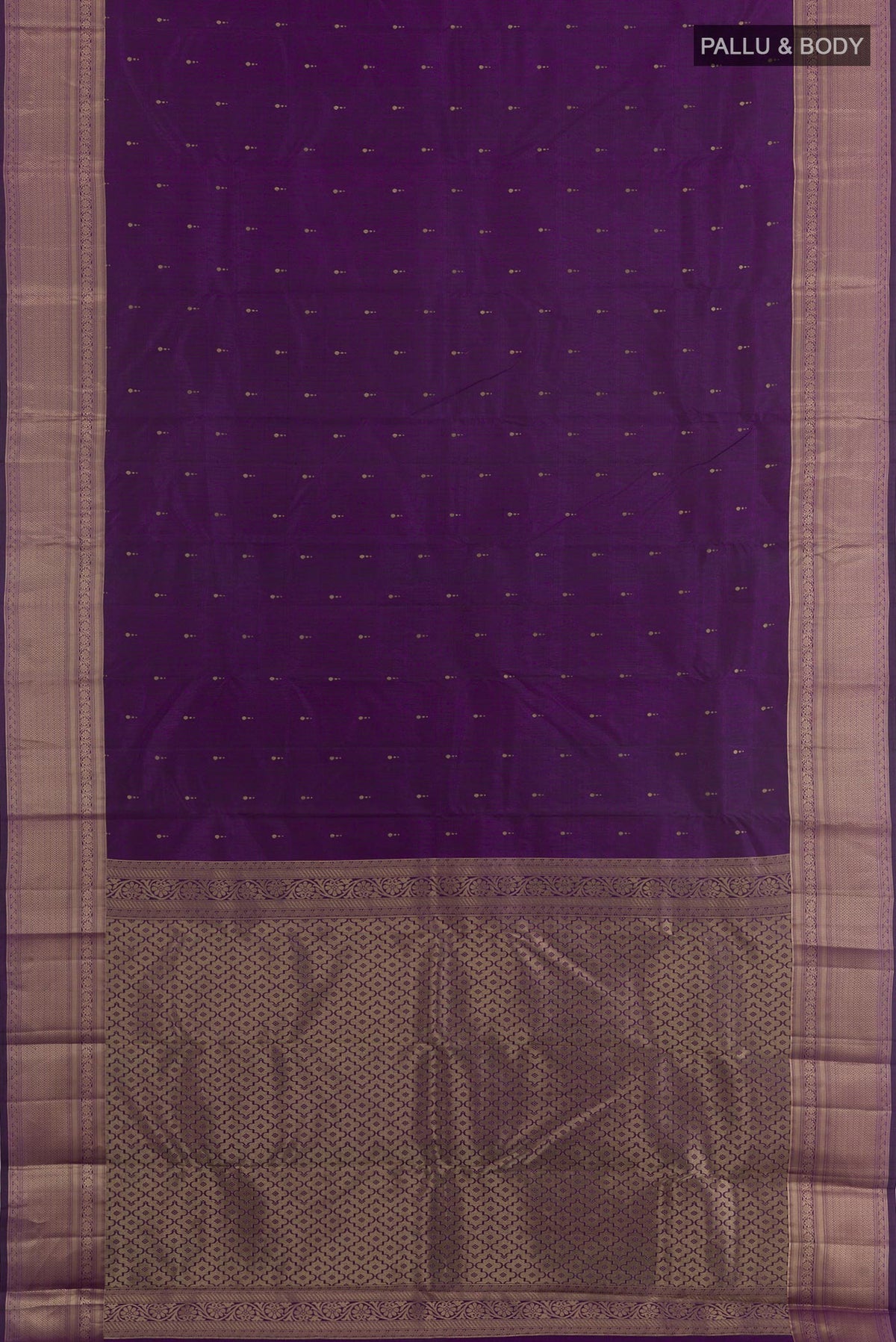 Flat view of Purple Kanchipuram Silk Saree with Zari Butta on the body and Zari Border. 