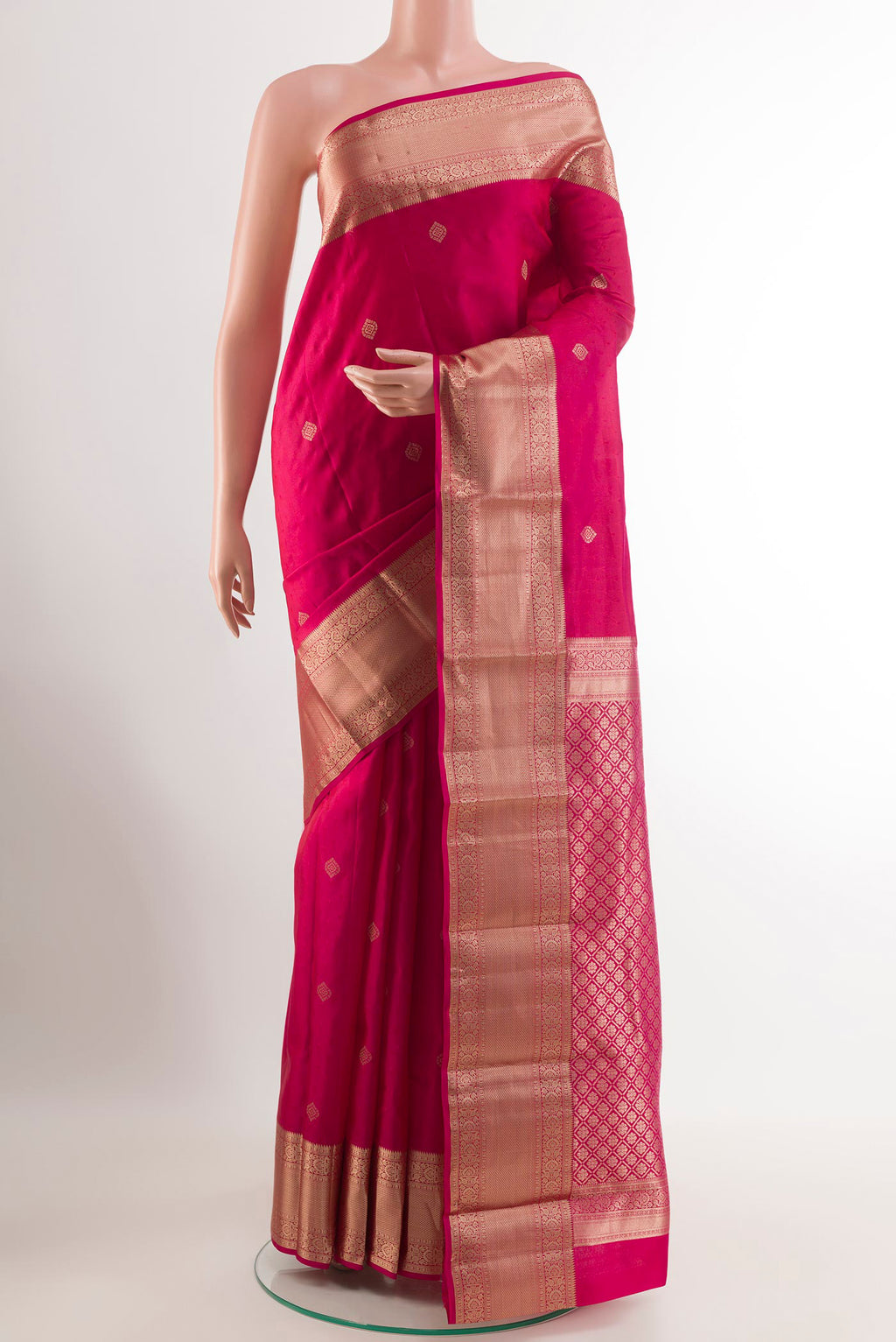 Pink Kanchipuram Silk Saree with Jacquard With Zari Butta on the body and Zari Border.  displayed on a mannequin
