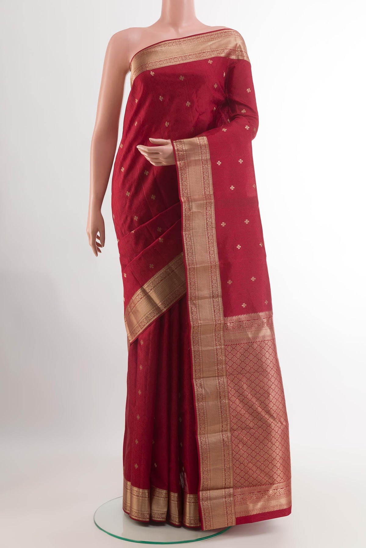 Maroon Kanchipuram Silk Saree with Jacquard With Zari Butta on the body and Zari Border.  displayed on a mannequin