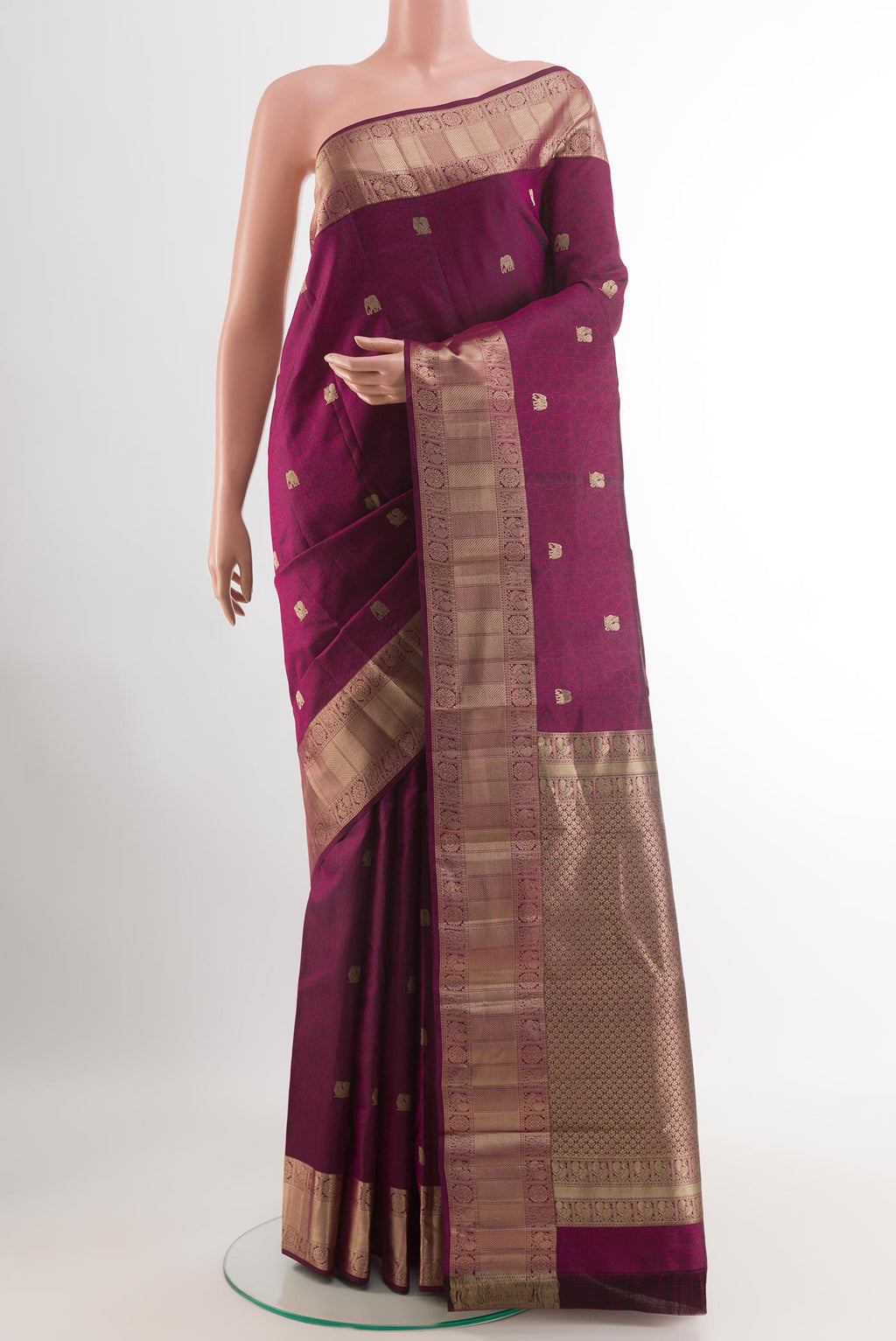 Purple Kanchipuram Silk Saree with Jacquard With Zari Butta on the body and Zari Border.  displayed on a mannequin