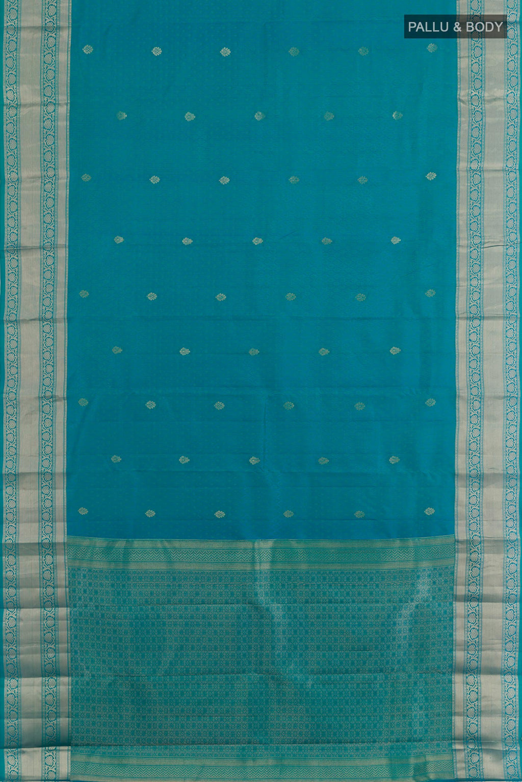 Flat view of Blue Kanchipuram Silk Saree with Jacquard With Zari Butta on the body and Zari Border. 