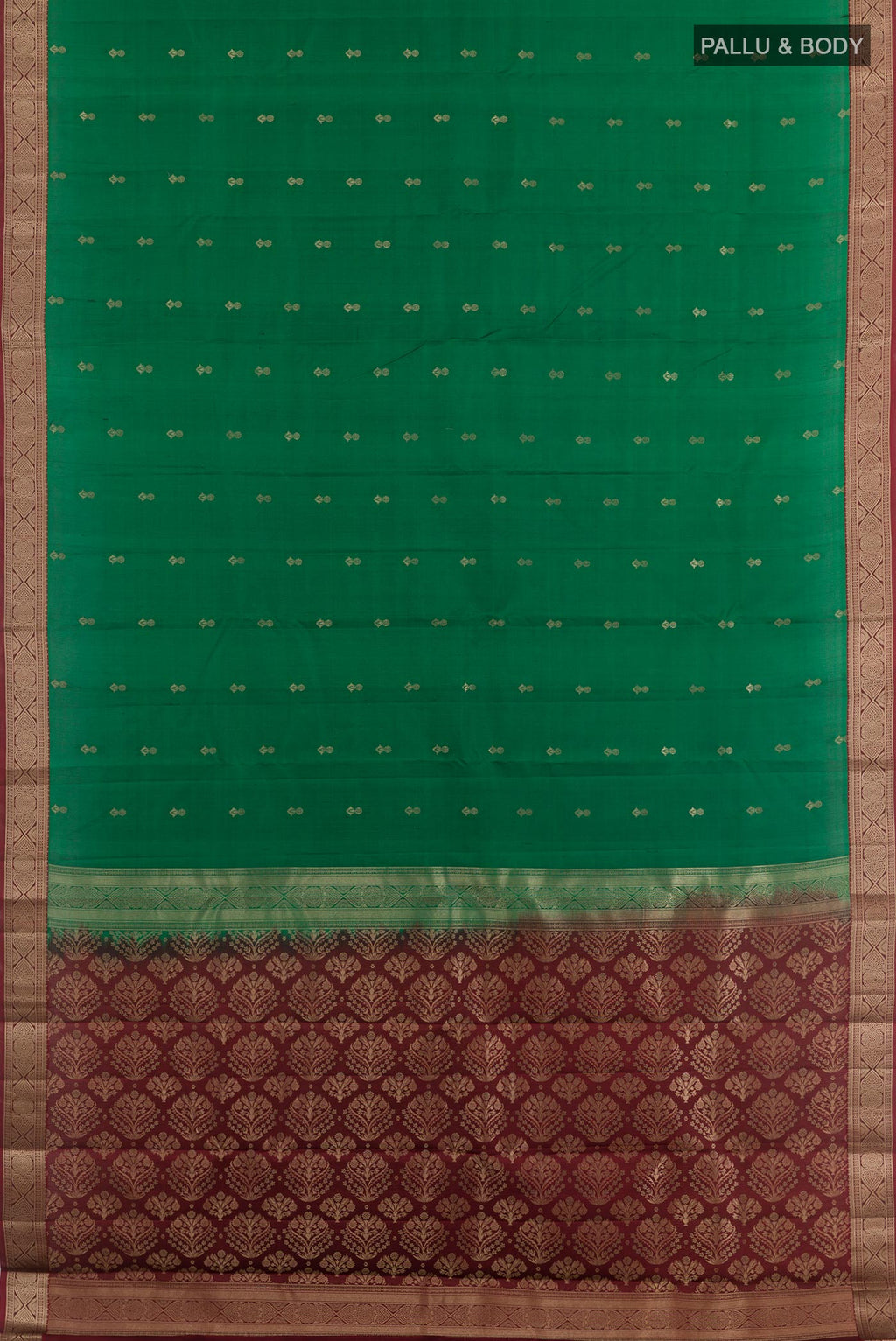 Flat view of Green Kanchipuram Silk Saree with Zari Butta on the body and Zari Border. 