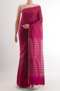 Pink Tussar Saree with Stripes on the body and Without Border.  displayed on a mannequin