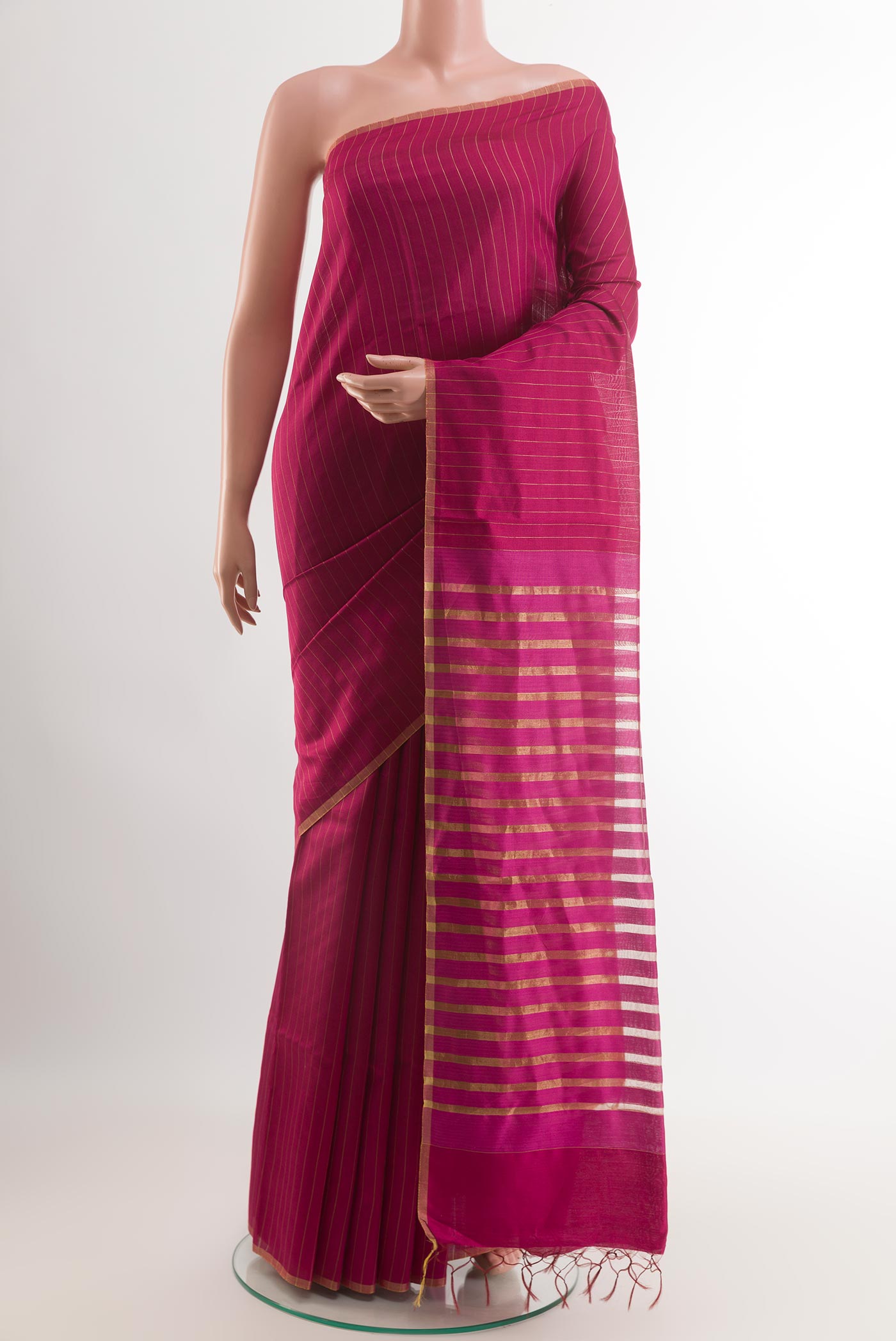 Pink Tussar Saree with Stripes on the body and Without Border.  displayed on a mannequin