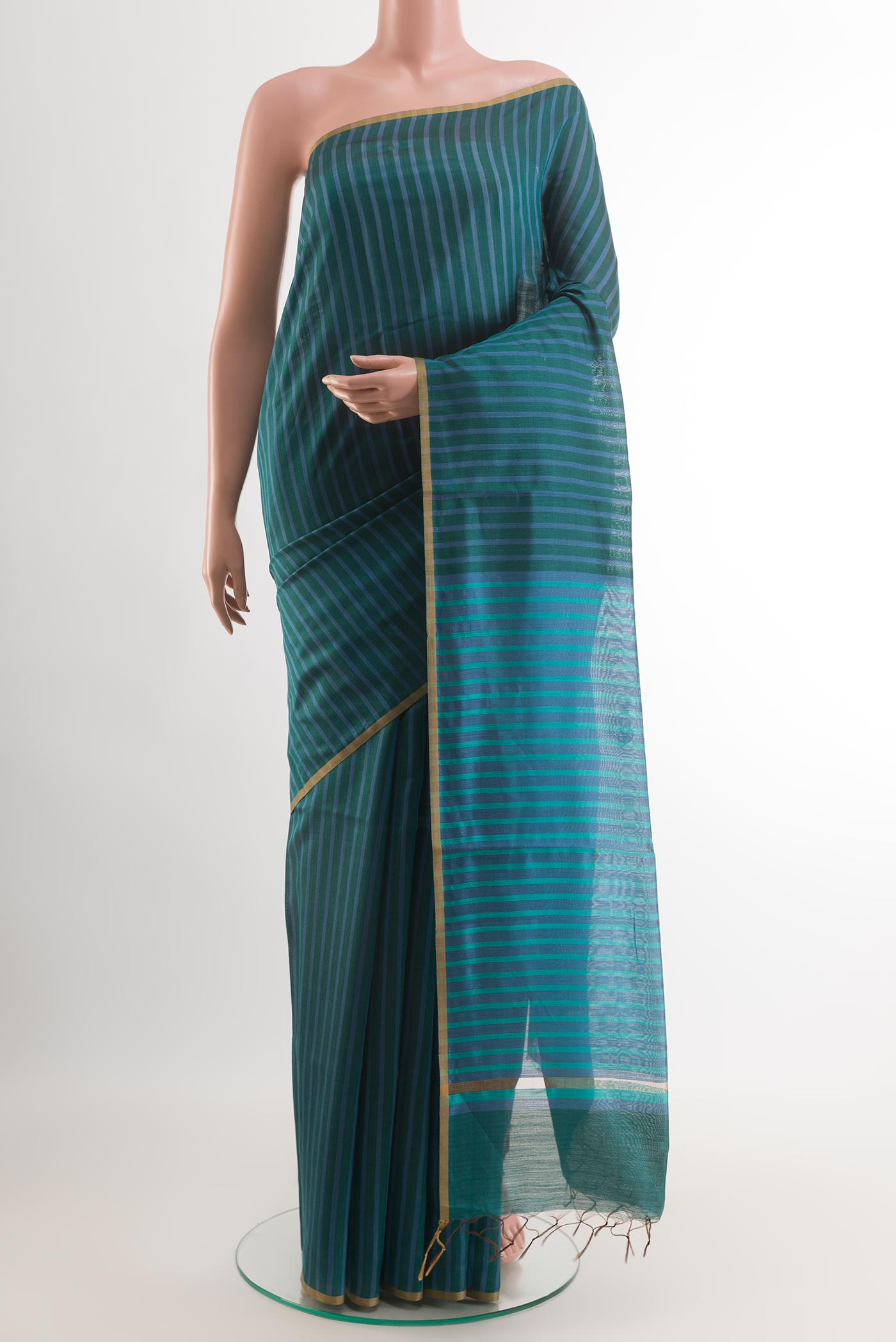 Blue Tussar Saree with Stripes on the body and Plain Border.  displayed on a mannequin