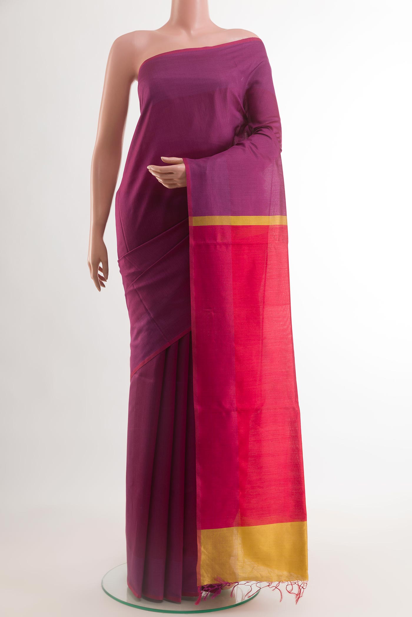 Red Tussar Saree with Checked design on the body and Plain Border.  displayed on a mannequin