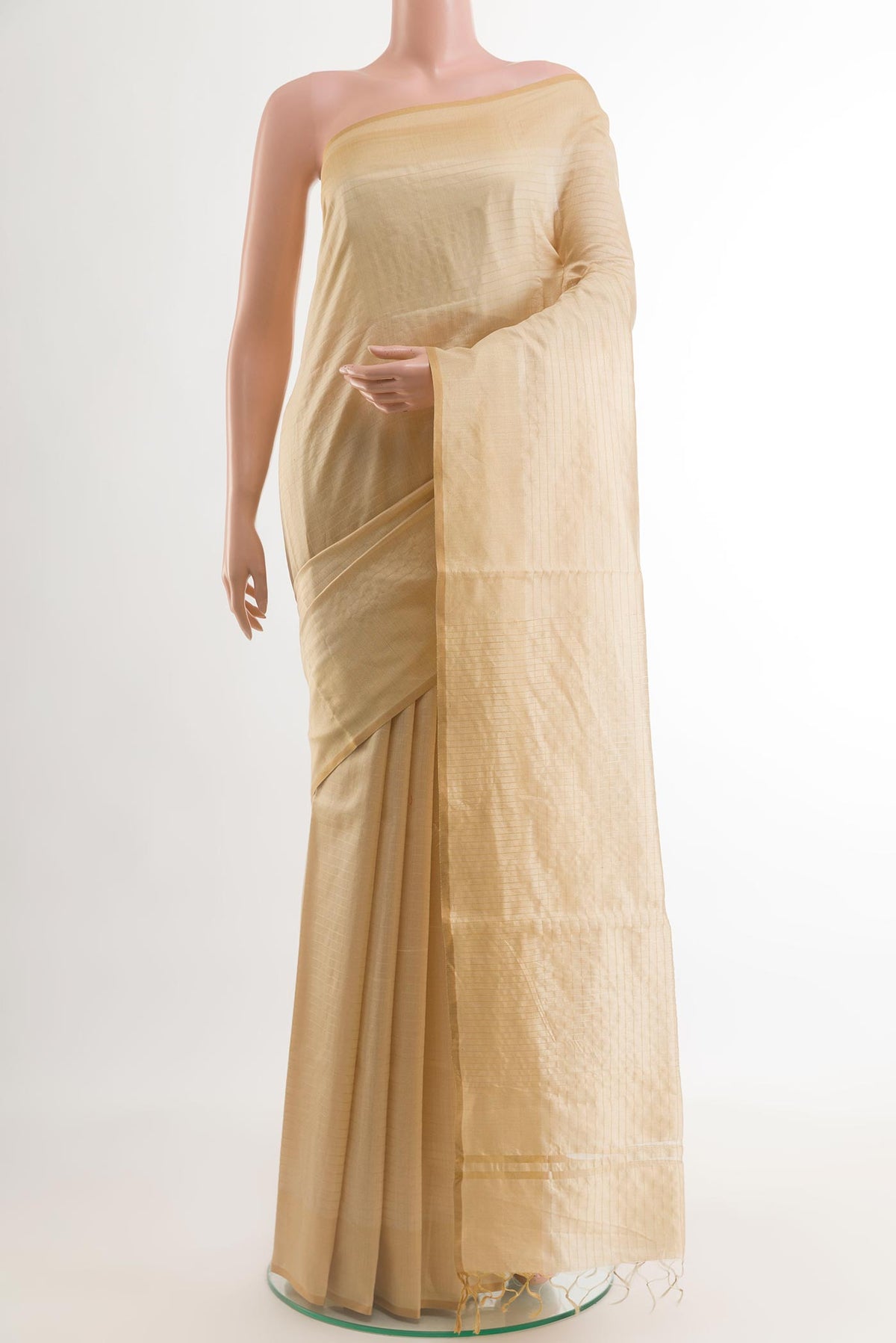Beige Tussar Saree with Checked design on the body and Plain Border.  displayed on a mannequin