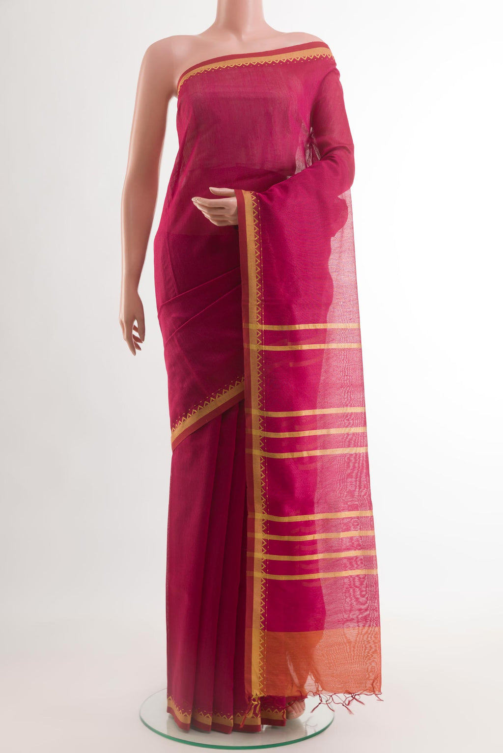Pink Tussar Saree with Stripes on the body and Plain Border.  displayed on a mannequin