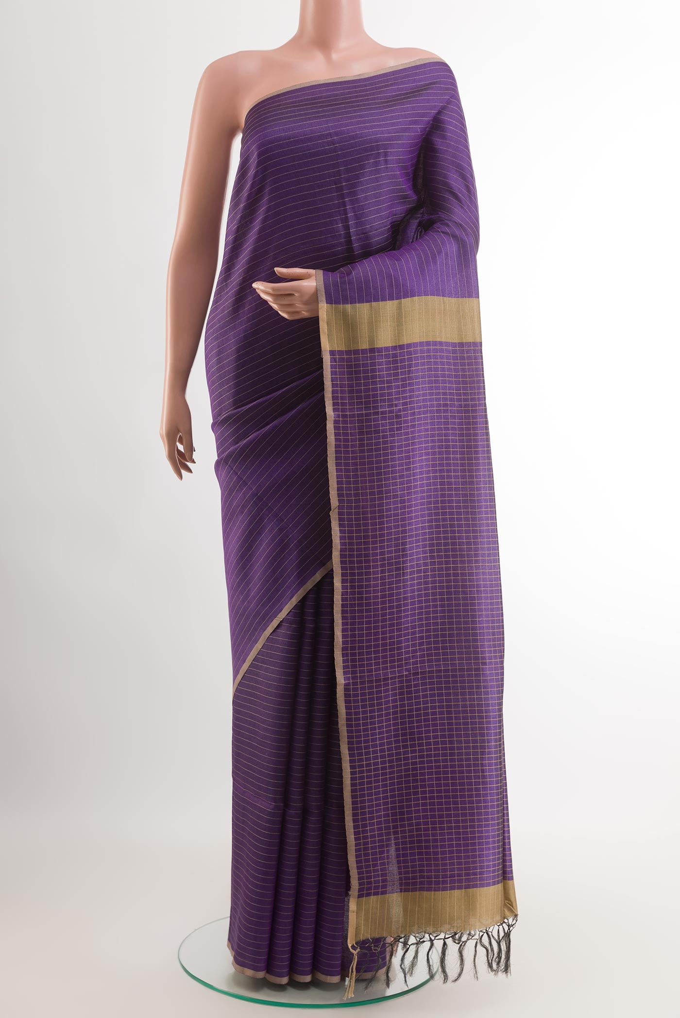 Purple Tussar Saree with Checked design on the body and Checks Border.  displayed on a mannequin