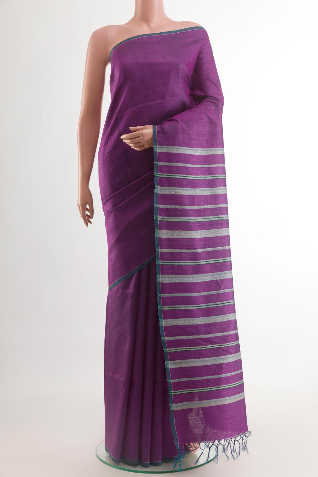 Purple Tussar Saree with Stripes on the body and Zari Border.  displayed on a mannequin